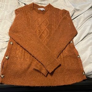 Brown size large sweater with buttons down side